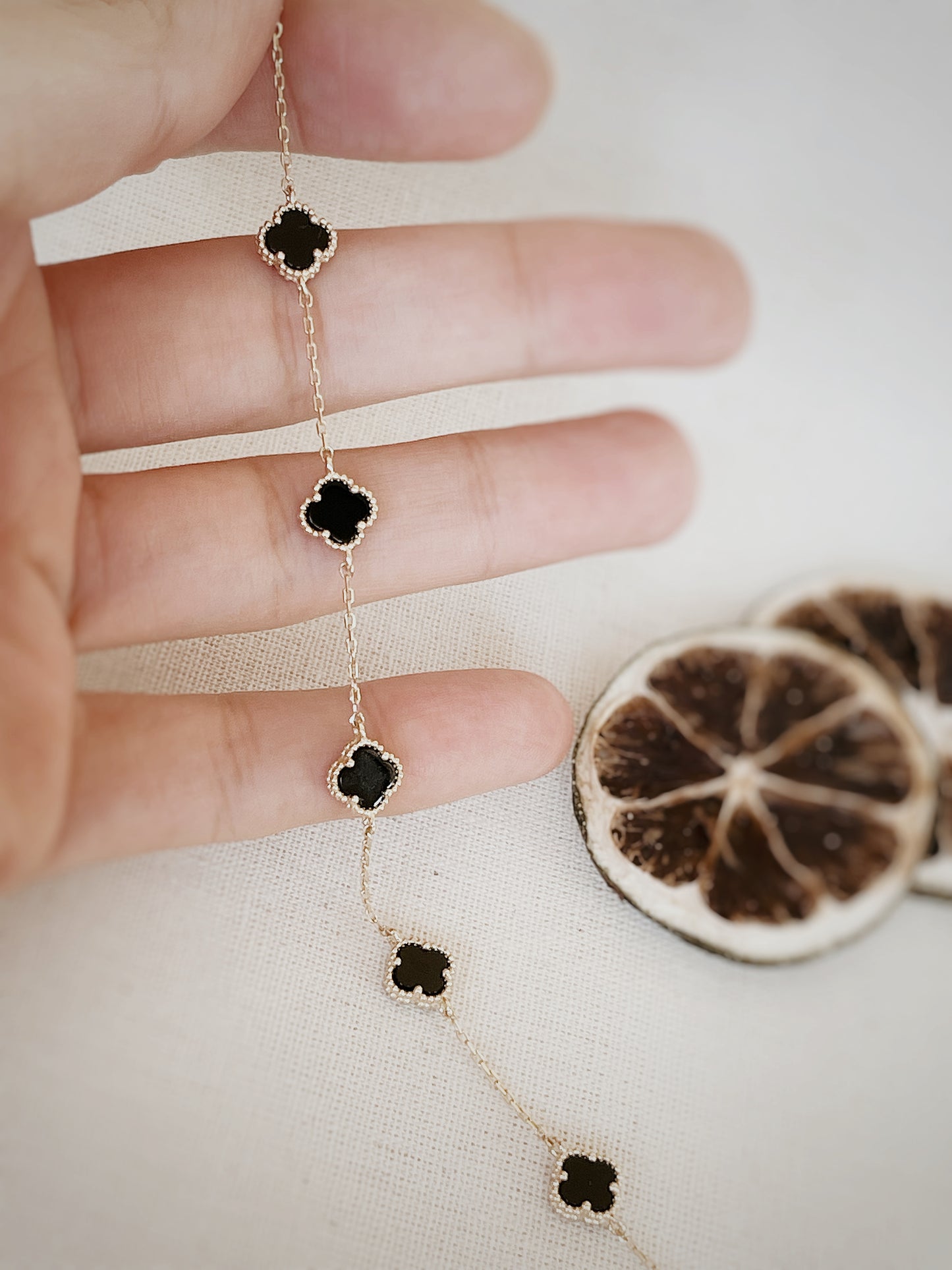 Solid Gold Black Four Leaf Clover Bracelet